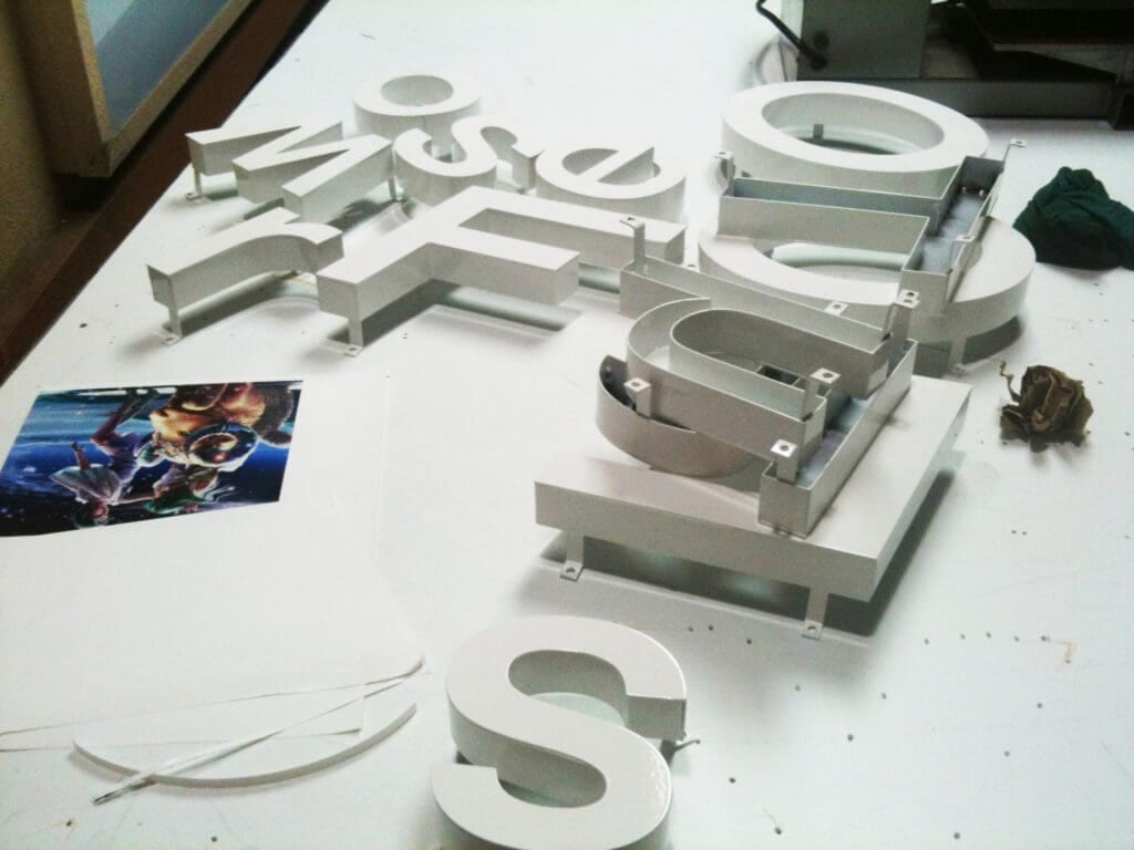 Logo Signs 6 Metal white letters sign