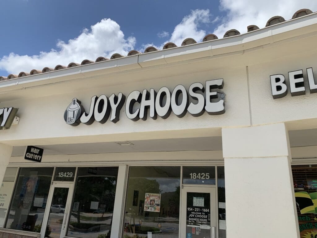 Home 30 joy choose front lit channel letter sign with round printed logo